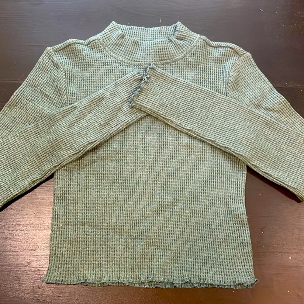 From Nordstrom, Woman’s small green sweater